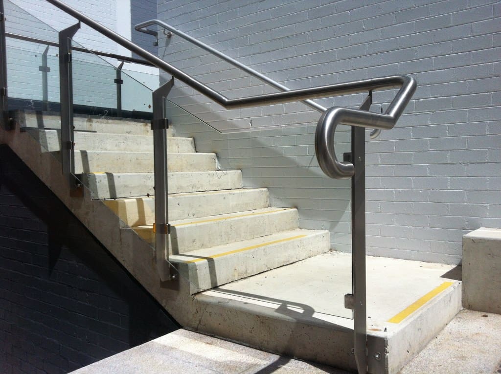 Semi-framed glass balustrade with SS handrail